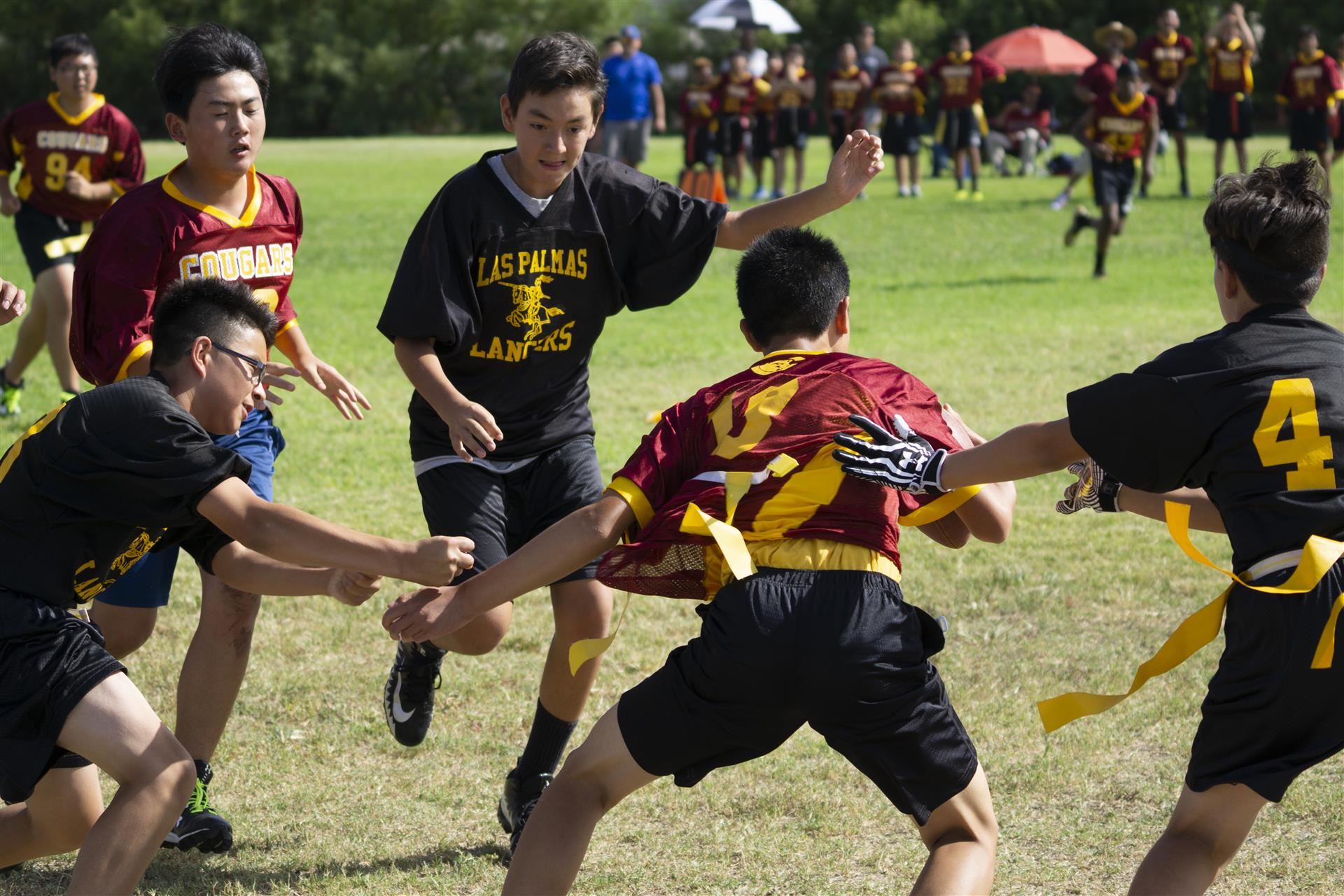 Students play football