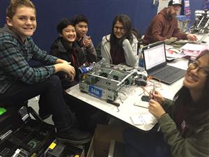 Students program robot Students program robot